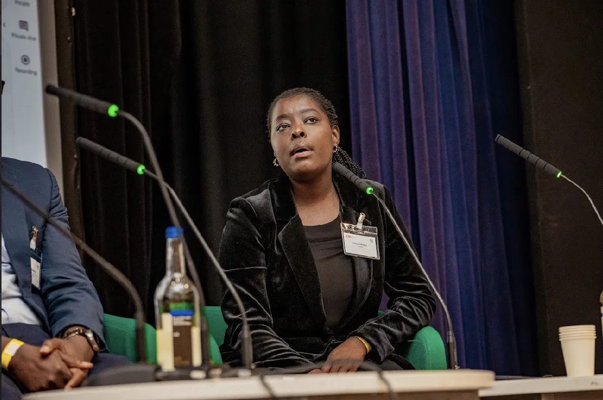 Irene Otieno speaking on a conference panel